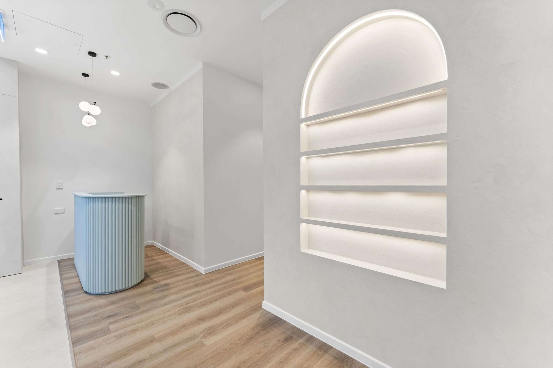 Modern office reception area with arched detailing